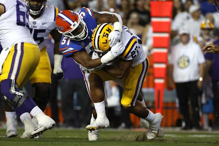 Florida Gators linebacker Ventrell Miller (51) tackles LSU Tigers running back Josh Williams (27). Mandatory Credit: Kim Klement-USA TODAY Sports